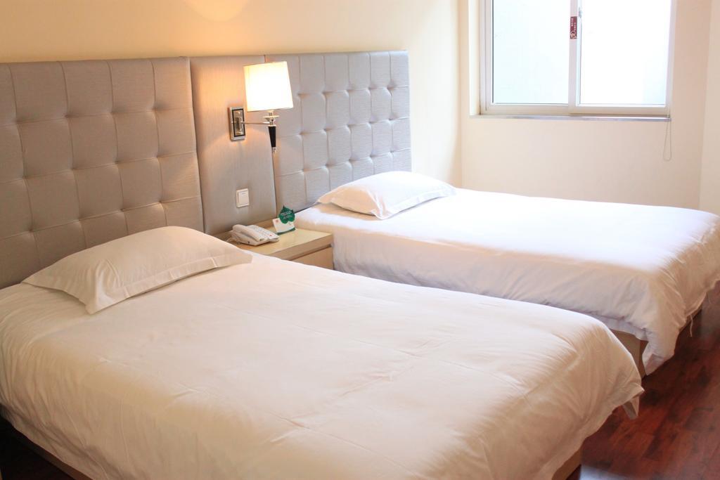 Qingdao Renjia Bussiness Hotel Cameră foto