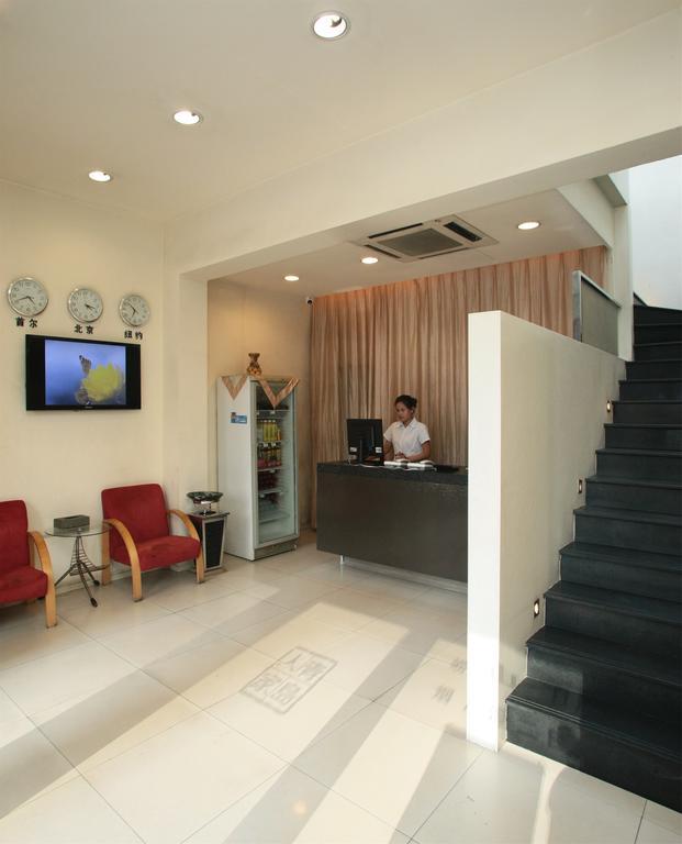 Qingdao Renjia Bussiness Hotel Exterior foto