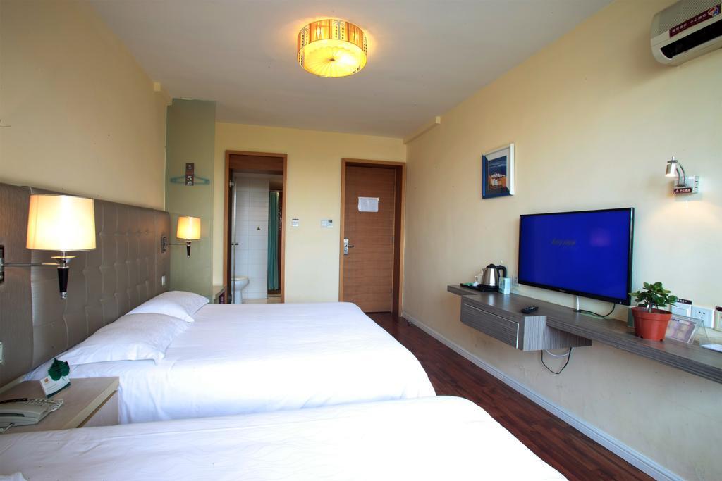 Qingdao Renjia Bussiness Hotel Exterior foto