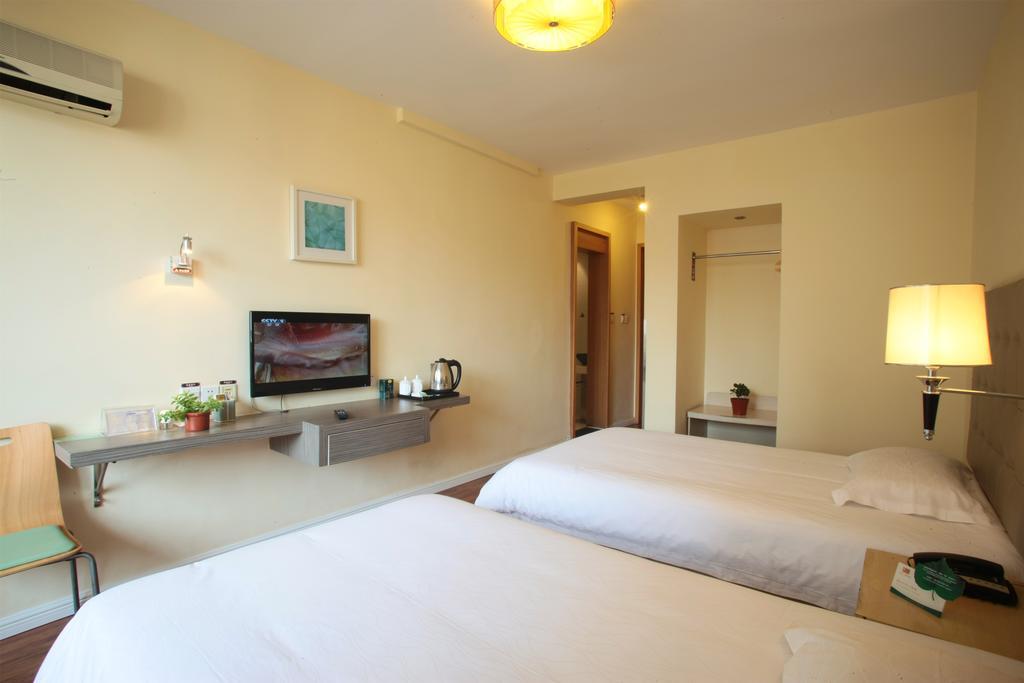 Qingdao Renjia Bussiness Hotel Exterior foto